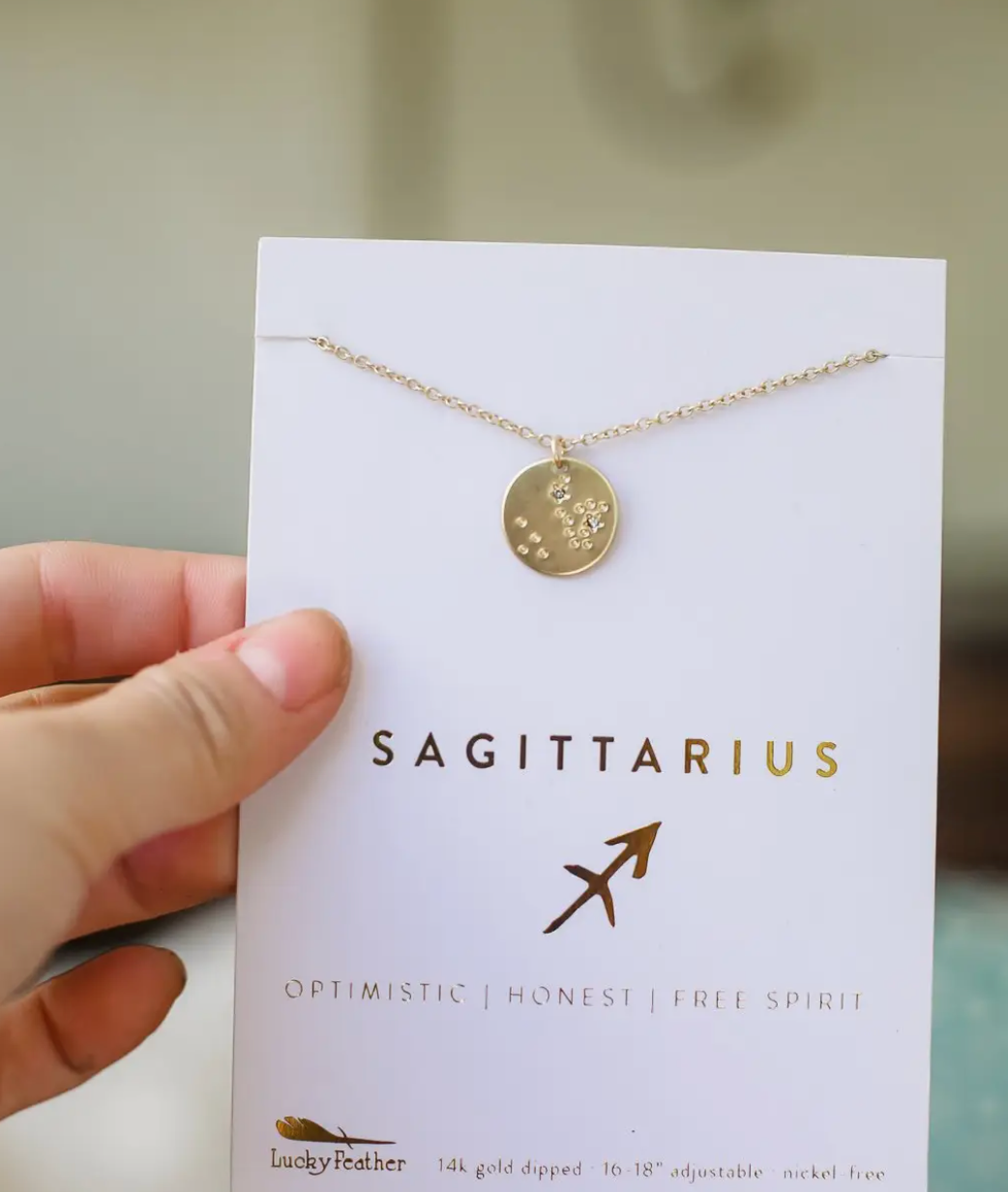 LUCKY FEATHER ZODIAC NECKLACE