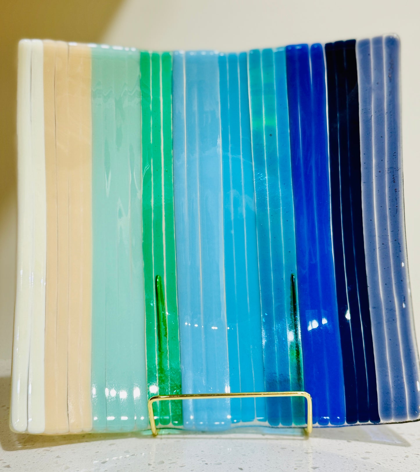 11: ELEVEN FUSED GLASS PLATES