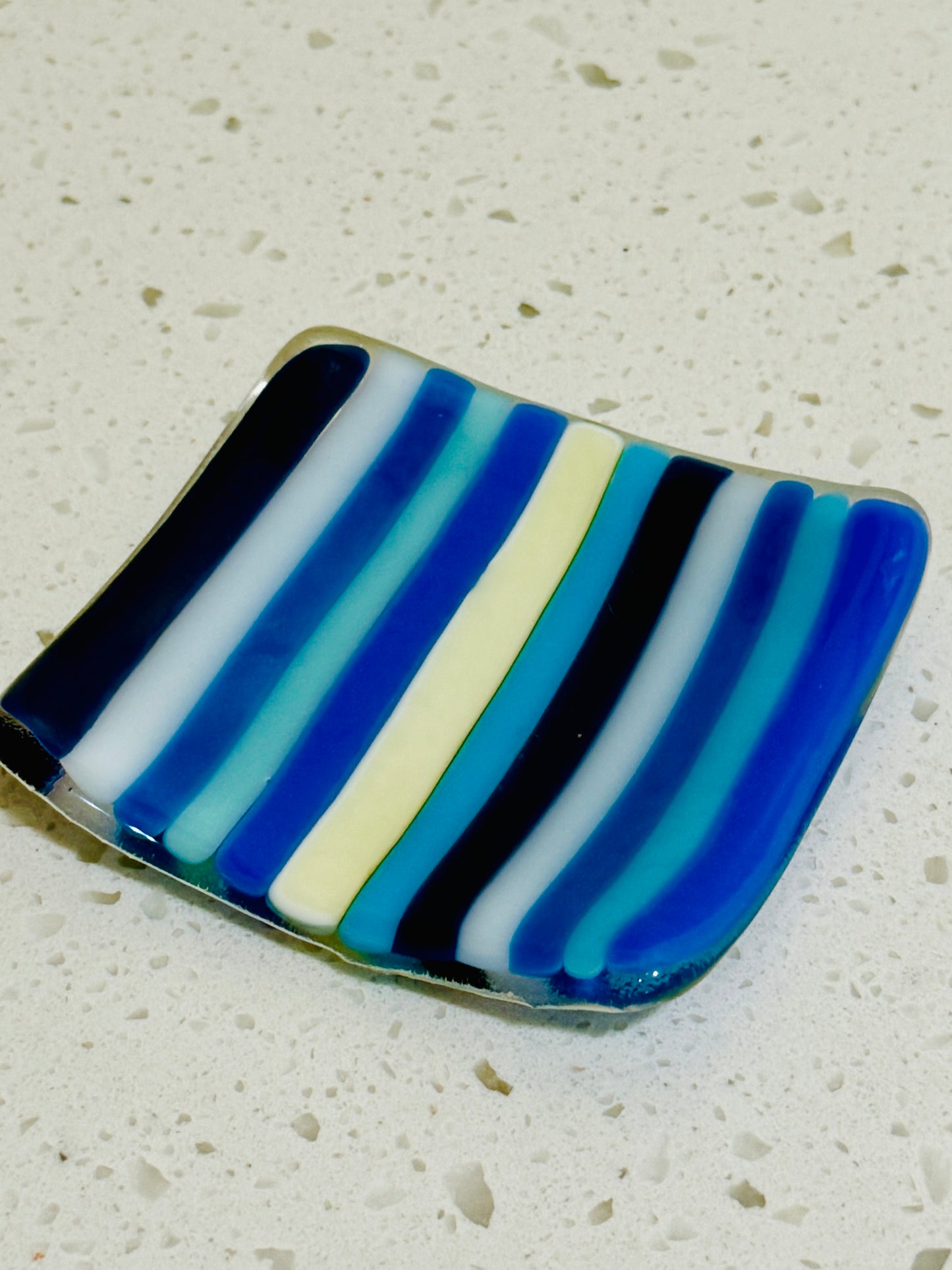 11: ELEVEN FUSED GLASS PLATES