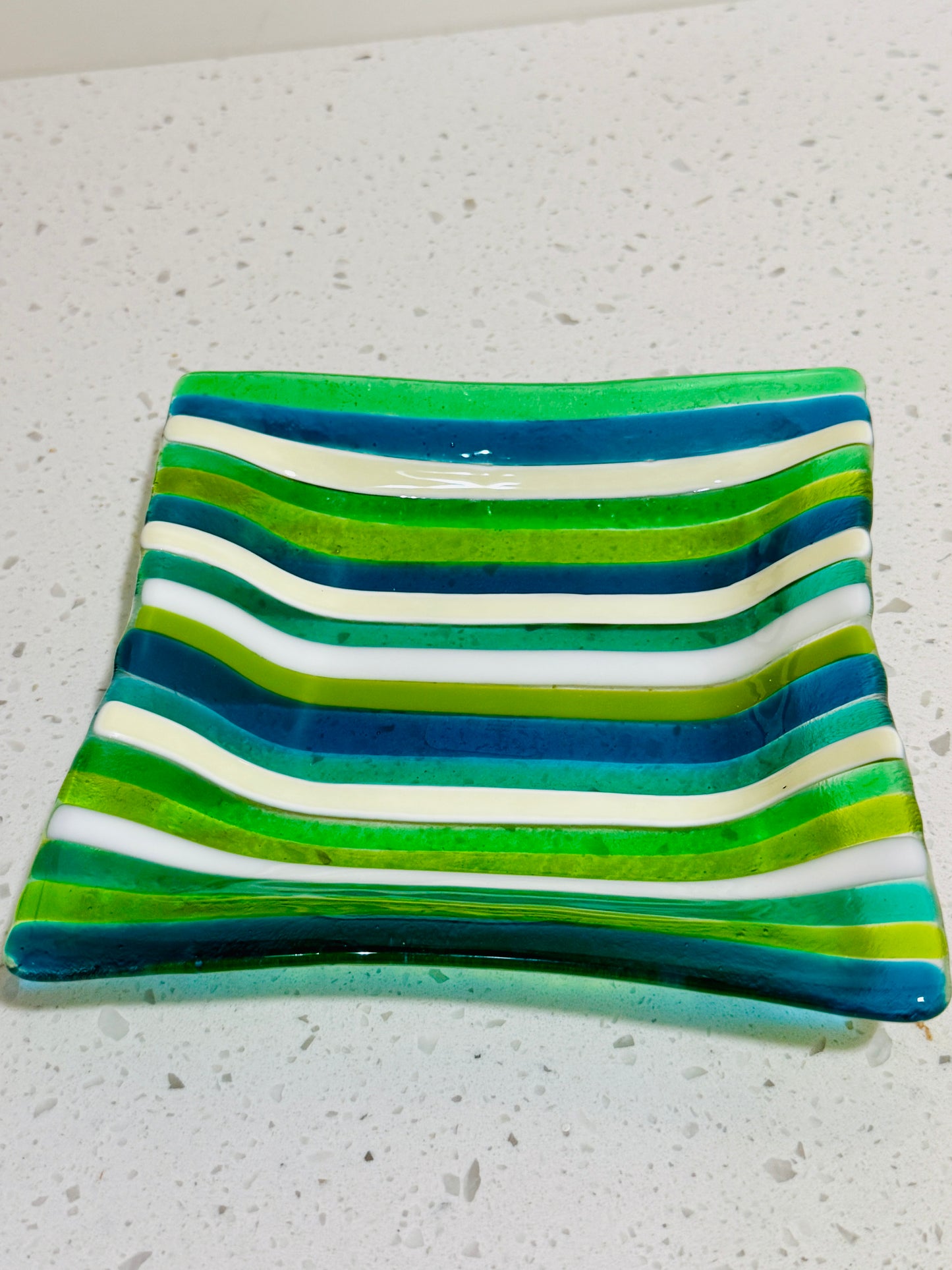 11: ELEVEN FUSED GLASS PLATES