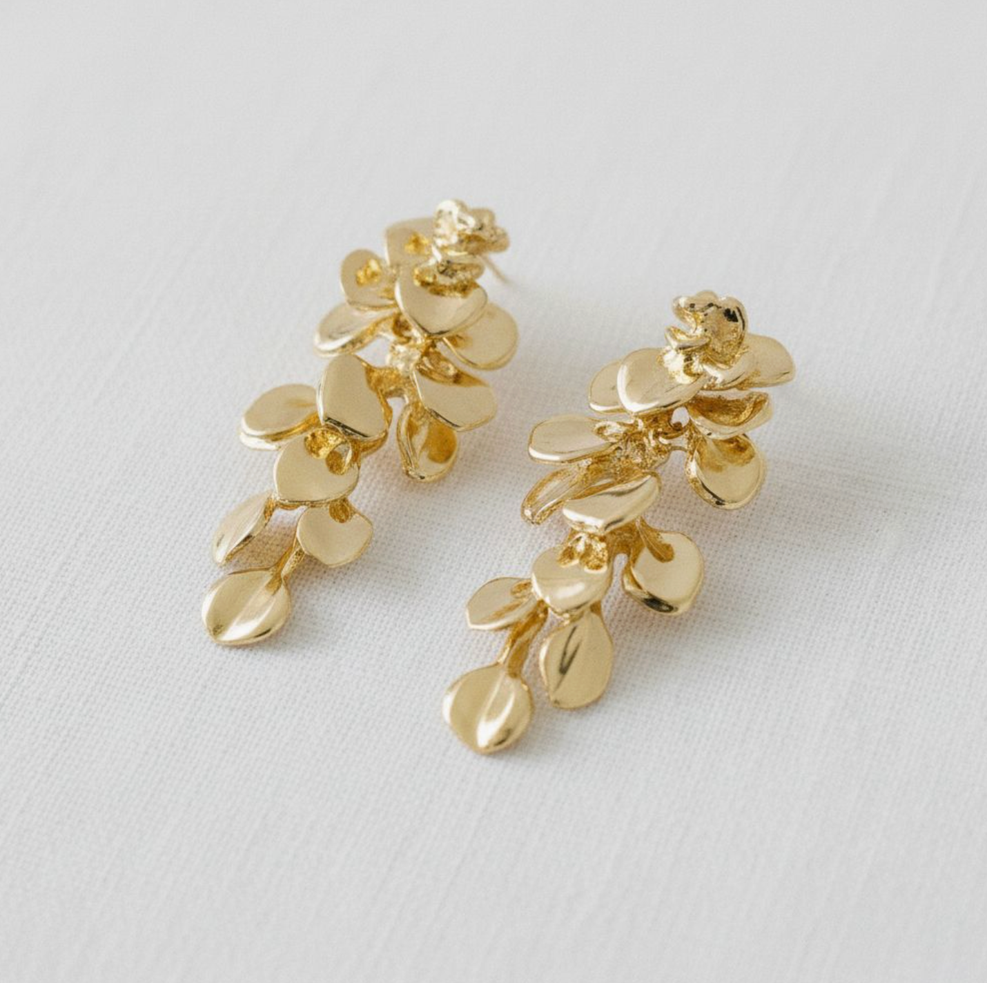 ELLEMADERA LEAF TASSLE EARRINGS