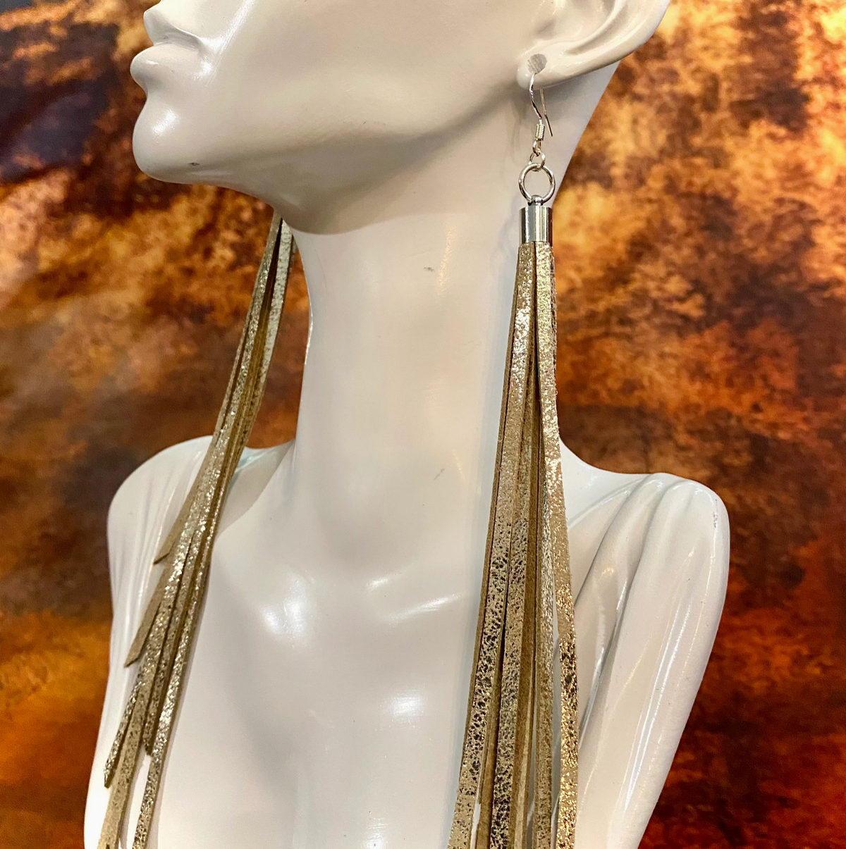 ASTALI LEATHER TASSEL EARRINGS