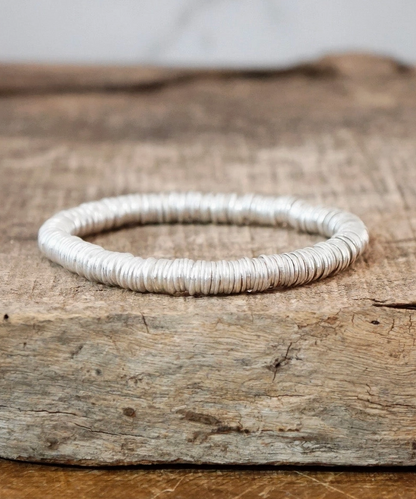 PENNYLINE HEISHI DISC BRACELETS