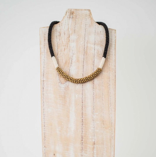 AID THROUGH TRADE DIVISION NECKLACE